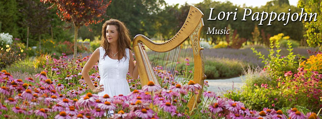 Lori Pappajohn with harp in a field of flowers.